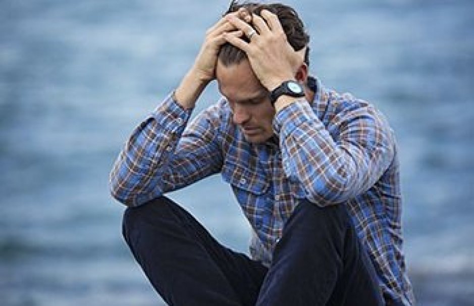 man-in-blue-and-brown-plaid-dress-shirt-touching-his-hair-897817.jpg